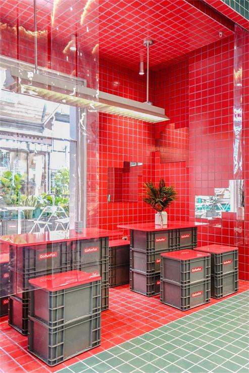 水果茶饮店红色用餐区设计特写